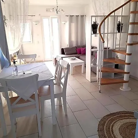 Boutique In Santorini Next To The Sea